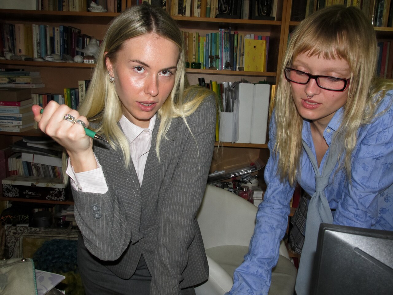 Two modern princesses at work, rings on
